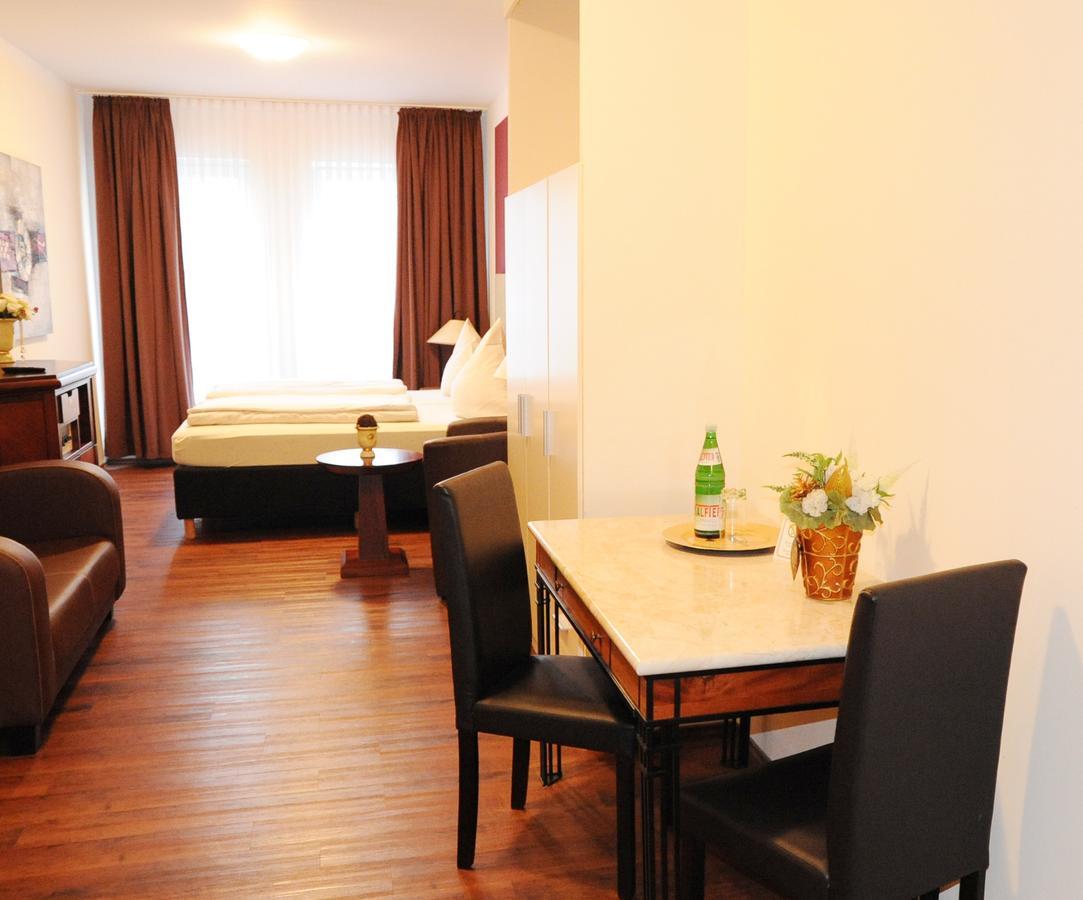 Aparthotel Scheuer Huerth Bagian luar foto