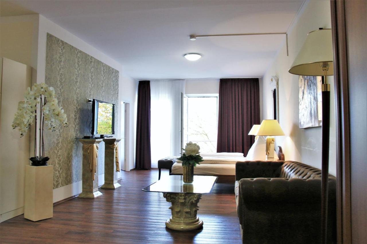Aparthotel Scheuer Huerth Bagian luar foto