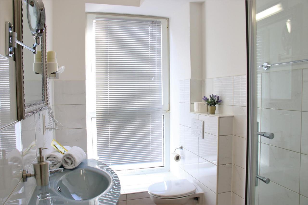 Aparthotel Scheuer Huerth Bagian luar foto